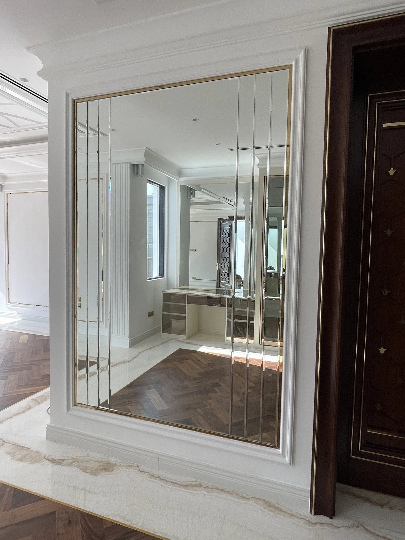 Panelled Mirror on Marble Feature Wall