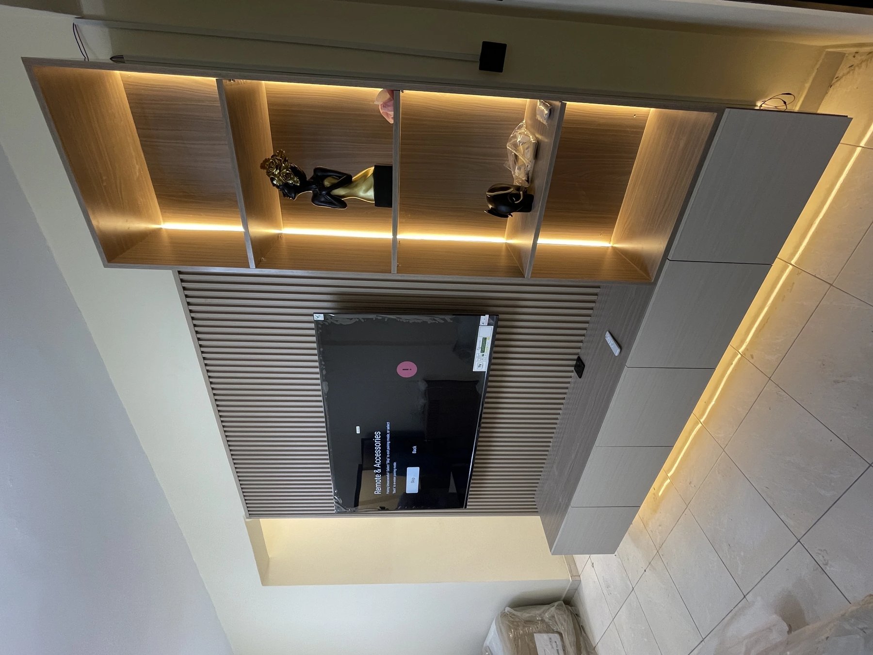 Wooden TV Joinery with LED-Lit Shelves